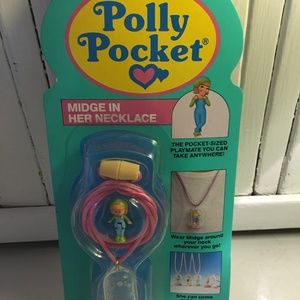 Mattel Vintage Polly Pocket Midge in her necklace